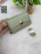 golden button purse